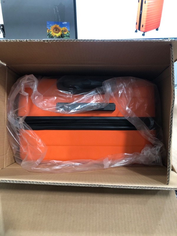 Photo 1 of Amazon Basics 30-Inch Hardside Checked Luggage, Hardshell Suitcase With Wheels, Expandable For Up to 15% More Space, With Scratch-Resistant Surface, Four Multi-directional Wheels, Orange