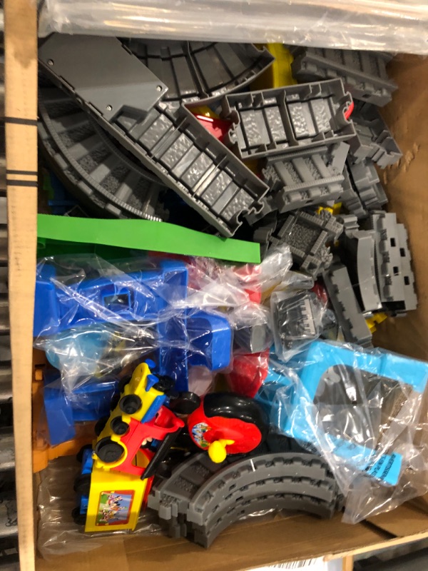 Photo 1 of Disney Junior Mickey Mouse Around Town Track Set, 35-piece Remote Control Toy Train, Officially Licensed Kids Toys for Ages 3 Up, Amazon Exclusive