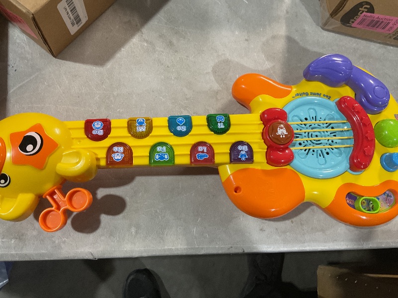 Photo 2 of **MISSING HARDWARE**
VTech Zoo Jamz Guitar (Frustration Free Packaging), Yellow, 80-179001