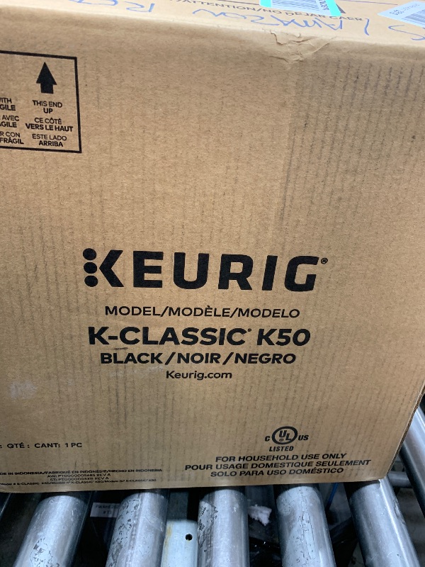 Photo 1 of Keurig black coffee maker 
