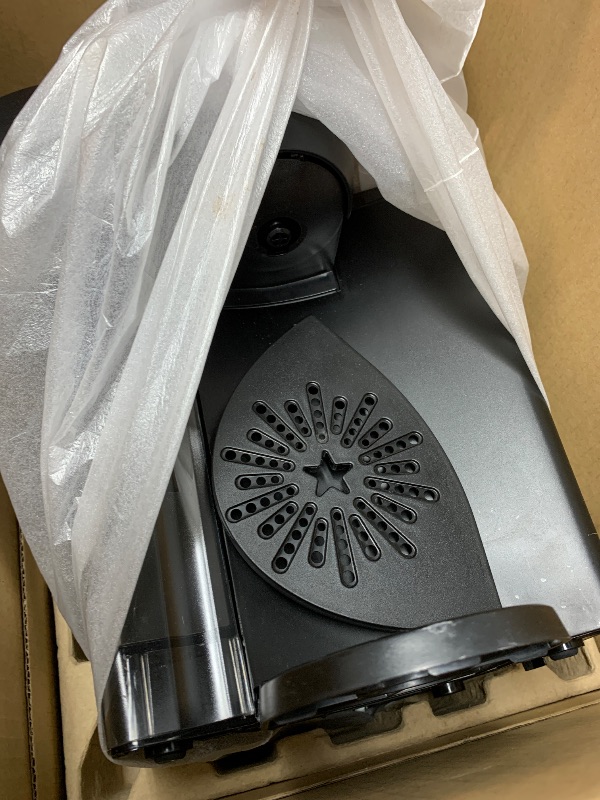 Photo 1 of Keurig black coffee maker 
