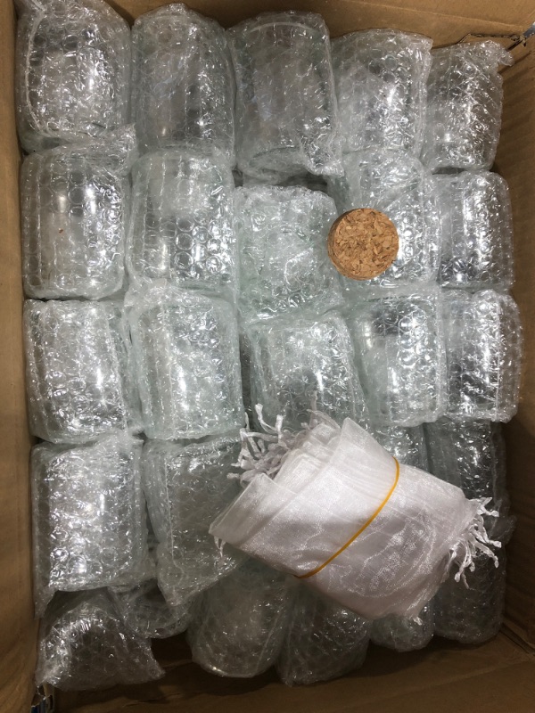 Photo 1 of ***SOME MISSING PIECES*** Suclain 50 Pack Glass Favor Jars with Cork Lid 3.4 oz Small Glass Bottles Jars with 100 Labels 50 Gift Bags Twine Mini Candy Containers for Wedding Favors Pudding Honey DIY Projects