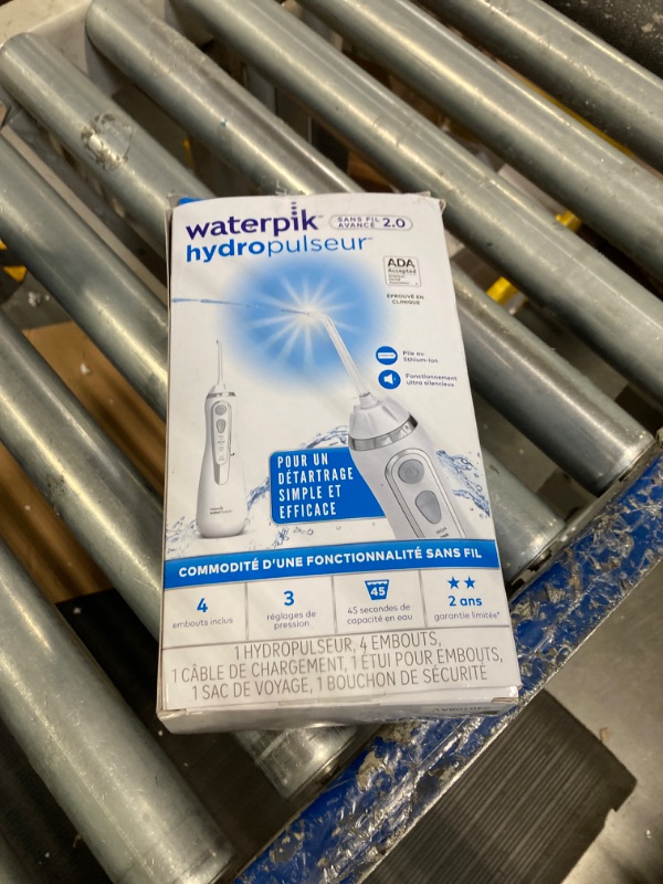 Photo 2 of ****USED****Waterpik Cordless Advanced 2.0 Water Flosser For Teeth, Gums, Braces, Dental Care With Travel Bag and 4 Tips, ADA Accepted, Rechargeable, Portable, and Waterproof, White WP-580, Packaging May Vary