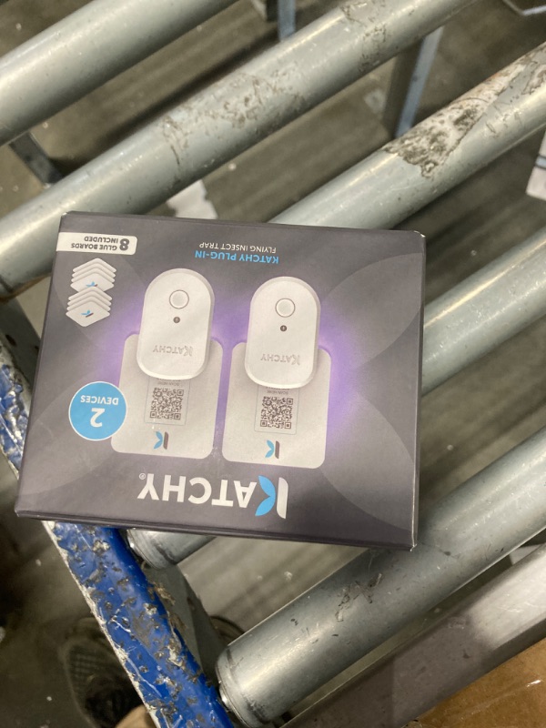 Photo 1 of KATCHY Indoor Plug-in Insect Trap - Catcher & Killer for House Flies, Mosquitoes, Fruit Flies, Gnants, and Mosquitos - Chemical-Free, Eco-Friendly, Easy to Clean (2 Pack with 8 Glue Boards)