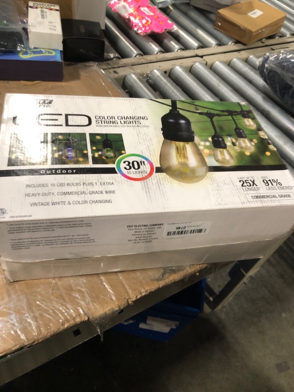 Photo 1 of Feit Electric 30ft LED Outdoor String Lights with Remote Control, 15 Sockets, 17pc. S14 LED Bulbs Included, E26 Base, Linkable, Multicolored, SL30-15/RGBW