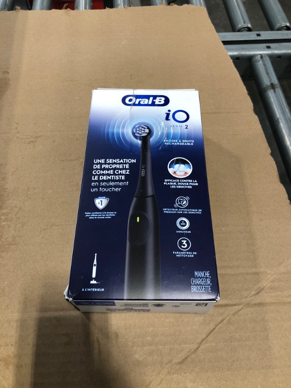 Photo 1 of Oral-B iO Series 2 Rechargeable Electric Powered Toothbrush, Night Black with 1 Gentle Care Brush Head - Automatic Pressure Sensor to Protect Gums - 3 Modes - 2 Min Timer