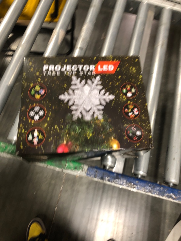 Photo 1 of Christmas Tree Topper Lighted with 6 Projection Slides, PliMook Snowflake Christmas Tree Topper LED Rotating 3D Lighted Tree Toppers Glitter Tree Topper Projector for Christmas Tree(Silver)