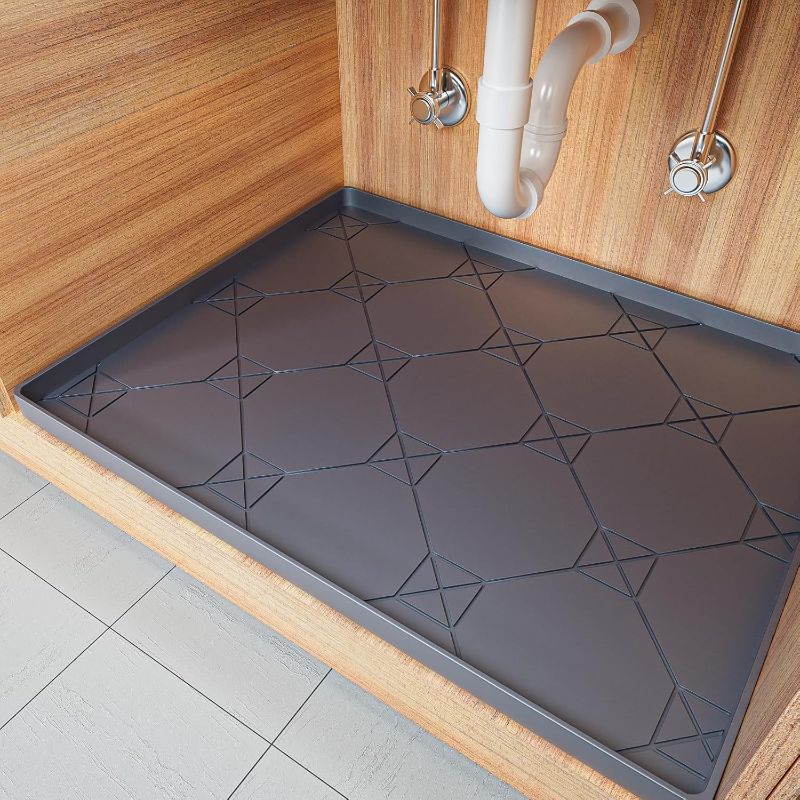 Photo 1 of  *SIMILAR TO STOCK PHOTO* Under The Sink Mat, 28" x 22" Waterproof Drip Tray Silicone Under Sink Mat Liner, Flexible Cabinet Shelf Protector Fit 30inch Standard Kitchen Bathroom Cabinet Under Sink Organizer
