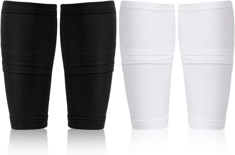 Photo 1 of Breathffy 4 Pairs Kids Soccer Shin Guard Socks Soccer Shin Guard Sleeves with Pocket Breathable Football Shin Guard Holders Leg Calf Compression Shin Guard Covers for Boys Youth Girls(Black, White)