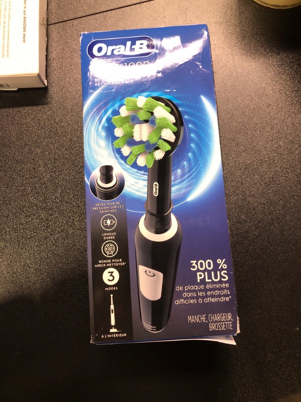 Photo 2 of 1000 CrossAction Electric Toothbrush