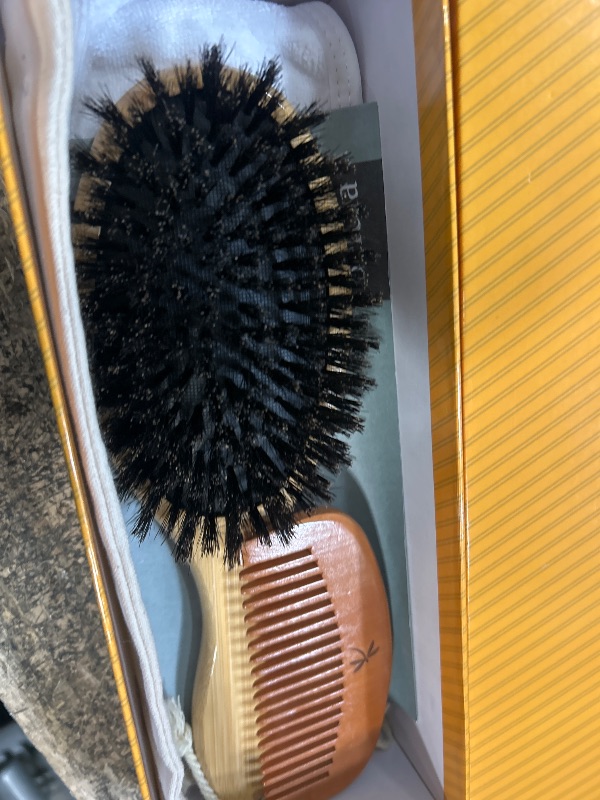 Photo 2 of **APPEARS NEW**
Belula 100% Boar Bristle Hair Brush Set (Large). Soft Natural Bristles for Thin and Fine Hair. Restore Shine And Texture. Wooden Comb, Travel Bag and Spa Headband Included!