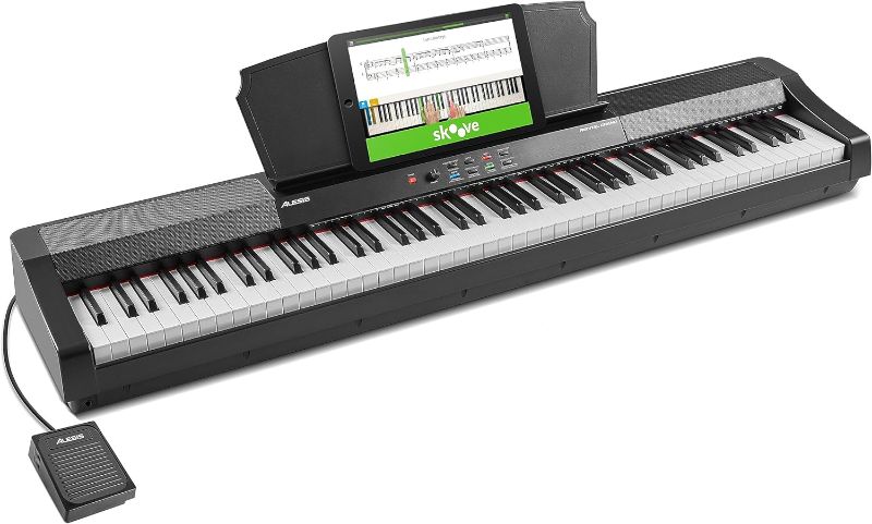 Photo 1 of Alesis Recital Grand - Digital Piano 88 Weighted Keys with Hammer Action, Sustain Pedal, 16 Premium Voices, Speakers, Piano Lessons, Sheet Music Stand