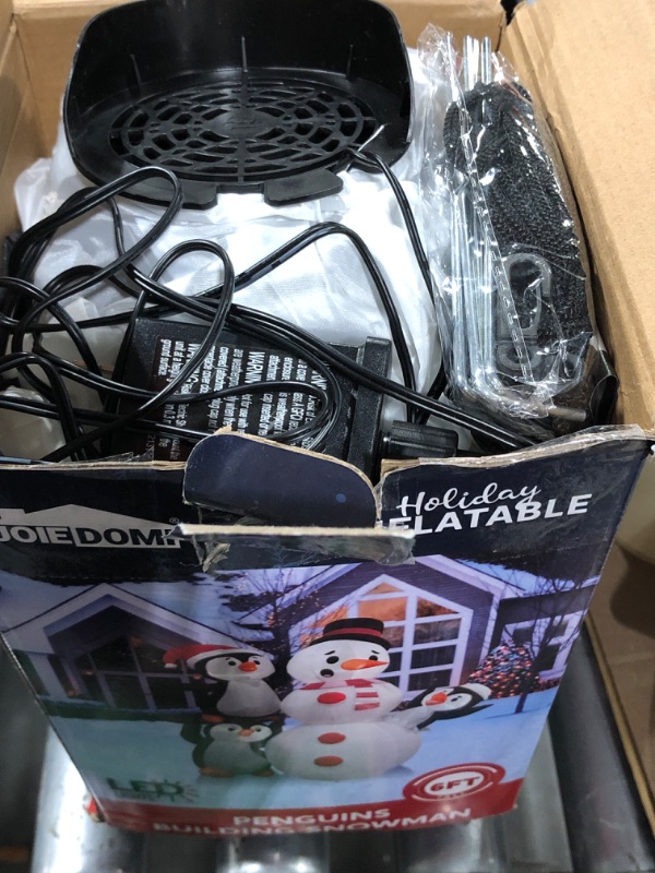 Photo 1 of JOIEDOMI 6 FT Tall Christmas Inflatables Outdoor Decorations, Inflatable Penguins Building Snowman, Blow Up Snowman with Build-in LEDs for Xmas Party Decor Yard Garden Indoor Holiday Decorations