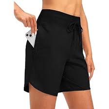 Photo 1 of Dyorigin Women's 7" Athletic Running Shorts with 3 Zipper Pockets Long High Waisted Shorts Women for Workout Gym Hiking(Black X-Large)