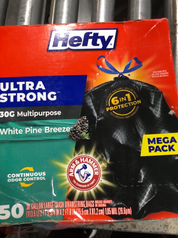 Photo 1 of ***ORIGINAL BOX WITH DAMAGE*** Hefty Ultra Strong 30 Gallon Trash Bags, Large Trash Bags 30 Gallon Size, Multipurpose, Break Resistant Drawstring Closure, Resists Leaks, Punctures, and Tears, Black, White Pine Breeze Scent, 50 Bags