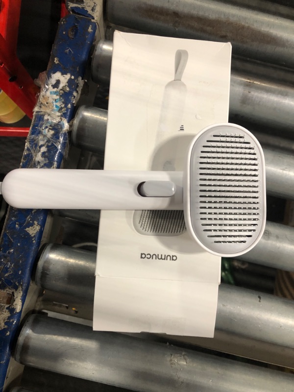 Photo 2 of Aumuca Cat Brush, Self Cleaning Cat Grooming Brush with Stable Thicker Bristles, Slicker Dog Brush to Remove Loose Fur, Tangles & Dirt, Great for Long and Short Haired Cats & Dogs (White)