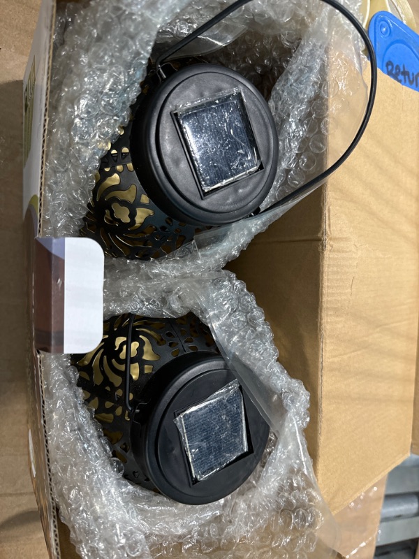 Photo 3 of {2 Pack} Outdoor Solar Hanging Lantern Lights Metal LED Decorative Light for Garden Patio Courtyard Lawn and Tabletop with Hollowed-Out Design. 2 Color Options Black and Bronze.