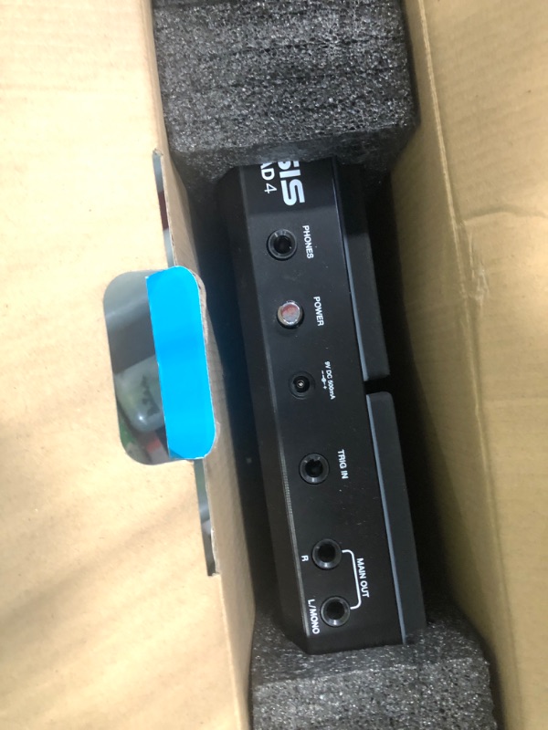 Photo 1 of Alesis Sample Pad 4 | Compact Percussion and Sample Triggering Instrument with 4 Velocity Sensitive Pads, 25 Drum Sounds and SD/SDHC Card Slot,Black