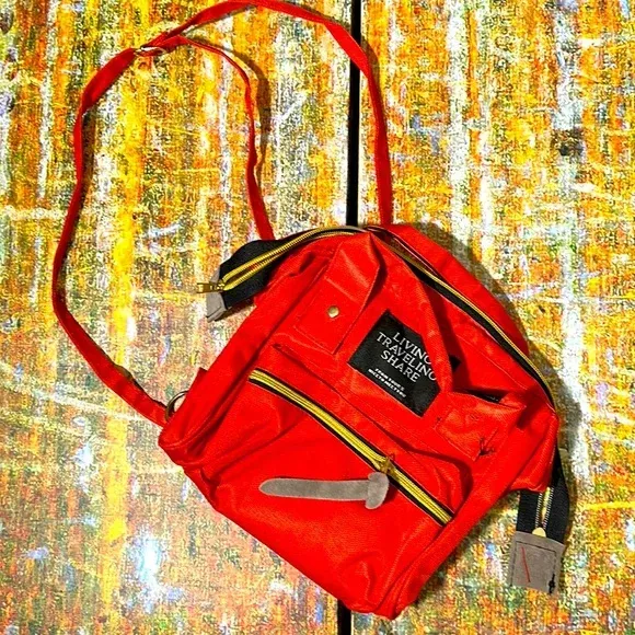 Photo 1 of ***similar*** Living traveling share red crossbody bag