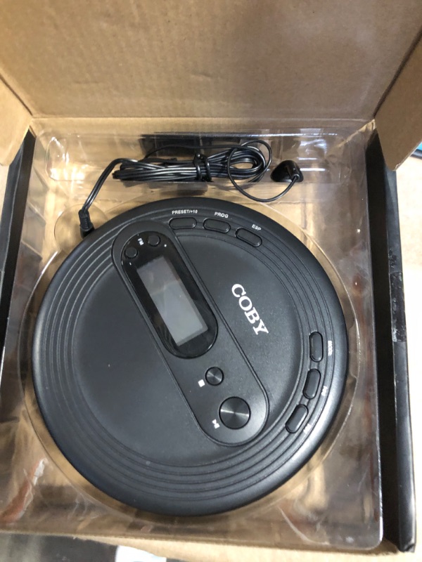 Photo 1 of COBY Portable CD Player with Earbuds, FM Radio & MP3 | Skip Protection, Lightweight & Shockproof Music Compact Disc Player | Portable Discman Perfect for Home Car and Travel