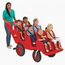 Photo 1 of ***PICK-UP WITH TRUCK/TRAILER*** 
Children's Factory Angeles Bye Bye Buggy 6 Passenger Stroller | Sturdy Multi Passenger Daycare Stroller with Fat Tires | Easy-to-Fasten Safety Buckles, Parking Brake, & 360 Pivoting Wheels | Red
