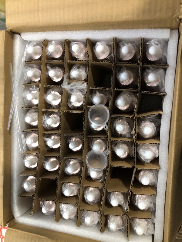 Photo 1 of **** 6 pcs missing***Easeen 48 Pack 1oz Rose Glass Dropper Bottles, Eye Dropper Bottles with Glass Droppers for Essential Oils, Perfumes (30ml, Rose Pink)