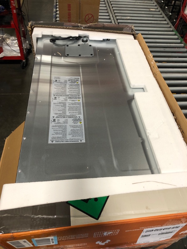 Photo 1 of Masterbuilt® 30-inch Digital Electric Vertical BBQ Smoker with Leg Kit, Side Wood Chip Loader and 710 Cooking Square Inches in Black, Model MB20070421 30" Smoker w/ Window & Legs