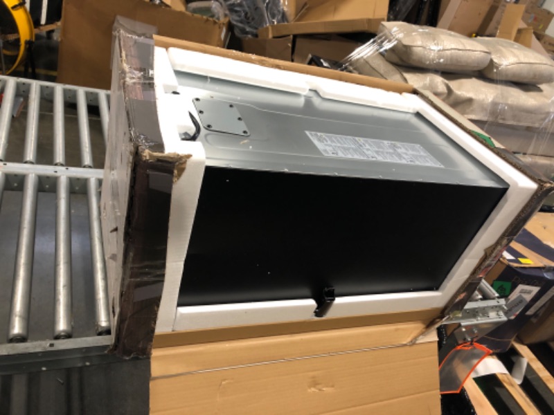 Photo 1 of Masterbuilt® 30-inch Digital Electric Vertical BBQ Smoker with Leg Kit, Side Wood Chip Loader and 710 Cooking Square Inches in Black, Model MB20070421 30" Smoker w/ Window & Legs