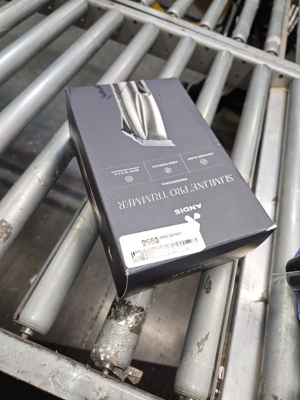 Photo 1 of **USED**
 Andis 32810 Slimline Pro Cord/Cordless Beard Trimmer, Lithium Ion T-Blade Trimmer, Close Cutting T-Blade Zero Gapped, Chrome