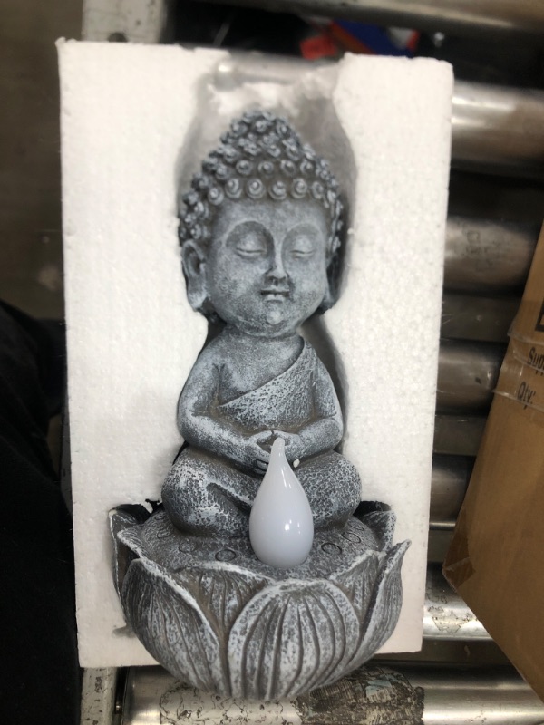 Photo 3 of *candle light does not power on**
 EPTUEGA Buddha Statue for Home and Outdoor Decor Solar Powered LED Garden Light Zen Meditation Spiritual Room Decor Buddha Garden Statue with Stone Facing Used for Home Garden Lawn Garden Decoration