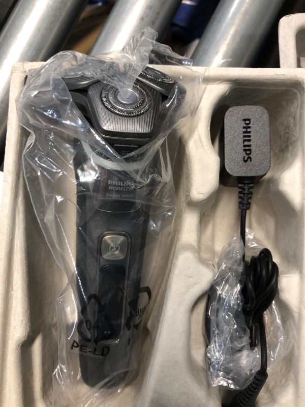 Photo 3 of ***(MISSING STORAGE CASE) ***
Philips Norelco 9800 Rechargeable Wet & Dry Electric Shaver with Quick Clean, Travel Case, Pop up Trimmer, Charging Stand, S9987/85