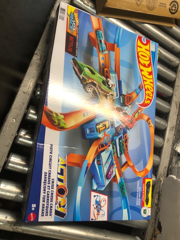 Photo 2 of ***FACTORY SEALED***Hot Wheels Toy Car Track Set, Criss Cross Crash with 1:64 Scale Vehicle, Powered by a Motorized Booster (Amazon Exclusive)