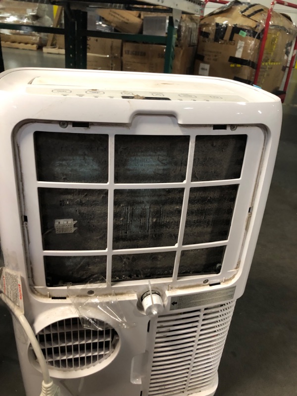 Photo 8 of ***USED - DIRTY - MISSING PARTS - SEE COMMENTS***
LG 6,000 BTU Portable Air Conditioner, 115V, Cools 250 Sq.Ft. (10' x 25' Room Size), Portable Air Conditioner for Home with Quiet Operation, LCD Remote Control, and Window Installation Kit, White