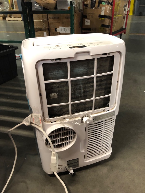 Photo 6 of ***USED - DIRTY - MISSING PARTS - SEE COMMENTS***
LG 6,000 BTU Portable Air Conditioner, 115V, Cools 250 Sq.Ft. (10' x 25' Room Size), Portable Air Conditioner for Home with Quiet Operation, LCD Remote Control, and Window Installation Kit, White