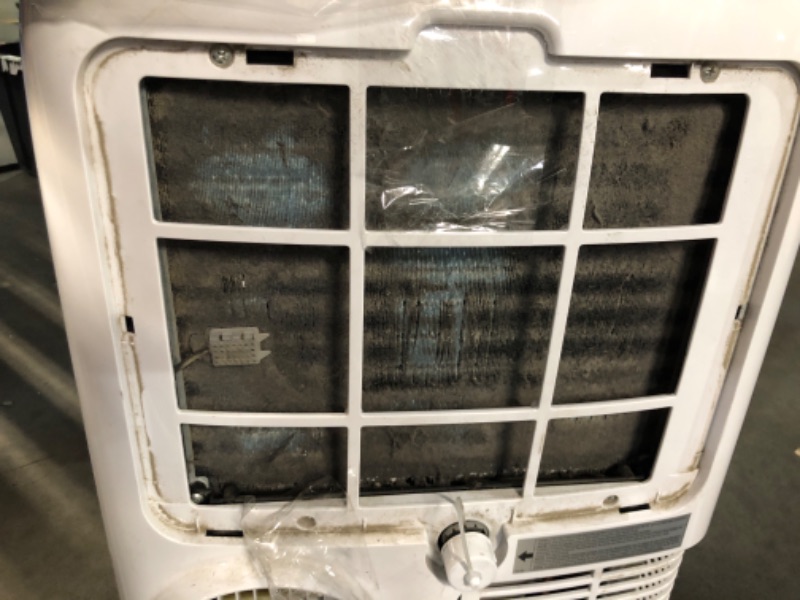 Photo 11 of ***USED - DIRTY - MISSING PARTS - SEE COMMENTS***
LG 6,000 BTU Portable Air Conditioner, 115V, Cools 250 Sq.Ft. (10' x 25' Room Size), Portable Air Conditioner for Home with Quiet Operation, LCD Remote Control, and Window Installation Kit, White