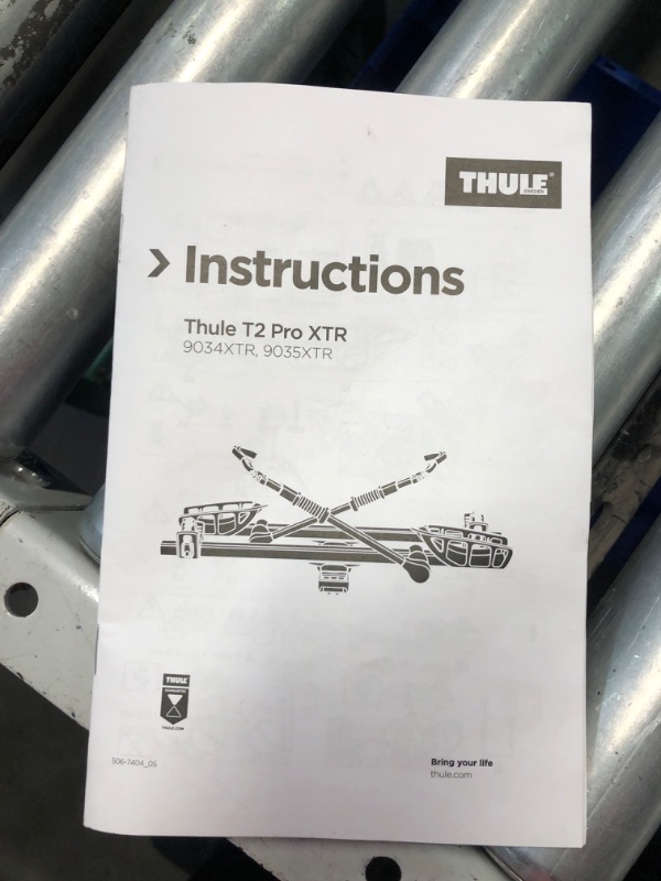 Photo 7 of ***USED - RUSTED - LIKELY MISSING PARTS - SEE PICTURES***
Thule T2 Pro XTR 2 Hitch Bike Rack - E-Bike Compatible - Tool-Free Installation - No Frame Contact - Tilts for Trunk Access - Fully Locking - Integrated Wheels for Transport - 120lb Load Capacity