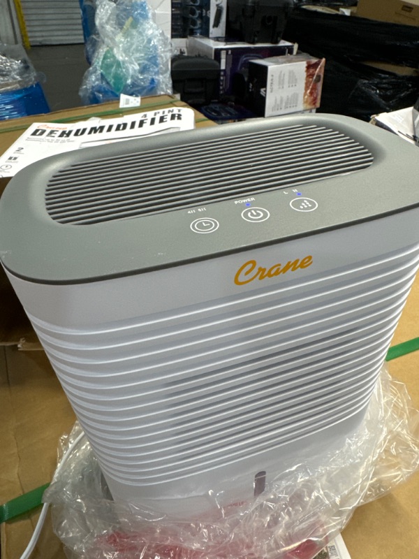 Photo 2 of *LIKE NEW**Crane Dehumidifier, Compact Portable Design, Effective Moisture Removal up to 300 Sq. Feet, 0.5 Gallon – 2 Liter Water Tank, White