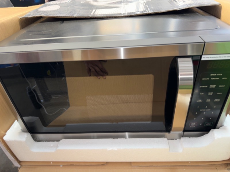 Photo 2 of *POWERS ON** 1.6 cu. ft. Countertop with Sensor Cook Microwave in Stainless Steel
