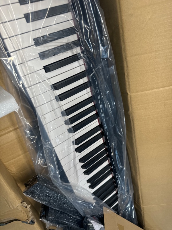 Photo 3 of *NO SERIAL NUMBER FOUND** GARVEE Piano Keyboard 88 Keys Semi-weighted, Full-Size Electric Keyboard Piano for Beginners,Portable Keyboard with Stand,Headphones,Sustain Pedal,Handbag,Bluetooth, USB MIDI
