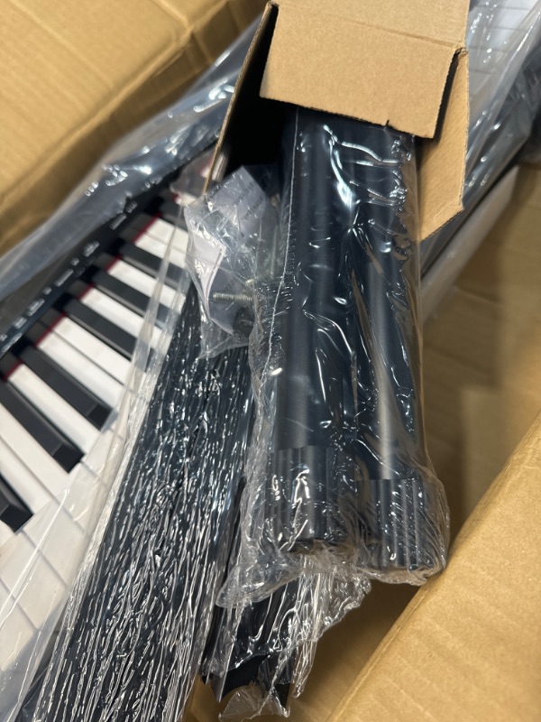 Photo 2 of *NO SERIAL NUMBER FOUND** GARVEE Piano Keyboard 88 Keys Semi-weighted, Full-Size Electric Keyboard Piano for Beginners,Portable Keyboard with Stand,Headphones,Sustain Pedal,Handbag,Bluetooth, USB MIDI
