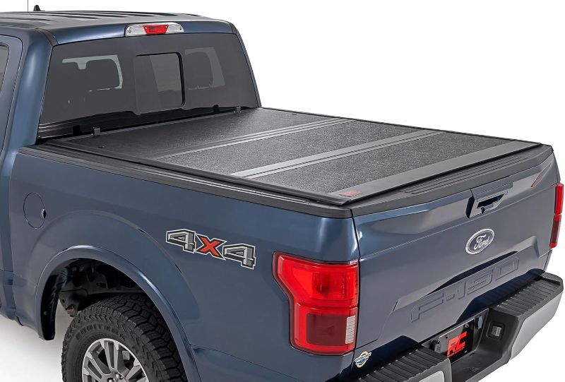 Photo 1 of * See notes* Rough Country Hard Low Profile Tri-Fold Truck Bed Tonneau Cover for Ford F-150 (2021-2024) - Fits 5'7" (67.1") Bed
