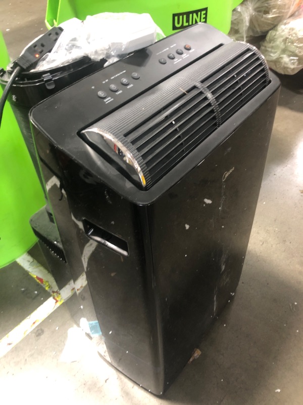 Photo 2 of * PARTS ONLY DOESNT POWER ON* Midea Duo 12,000 BTU (10,000 BTU SACC) High Efficiency Inverter, Ultra Quiet Portable Air Conditioner, Cools up to 450 Sq. Ft., Works with Alexa/Google Assistant, Includes Remote
