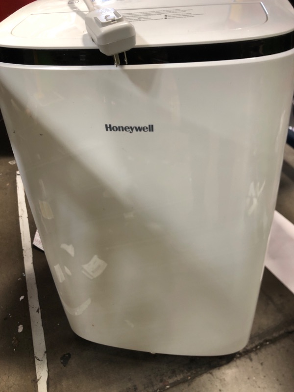 Photo 2 of * TESTED* Honeywell 10,000 BTU Portable Air Conditioner for Bedroom, Living Room, Office, Kitchen, 115V, Cools Up To 450 Sq. Ft. with Remote Control, Dehumidifier and Fan, 24-hour Timer, White 10,000 BTU 450 Sq. Ft.