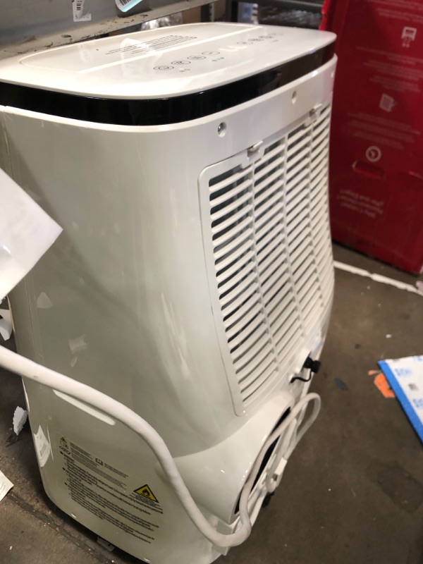 Photo 3 of * TESTED* Honeywell 10,000 BTU Portable Air Conditioner for Bedroom, Living Room, Office, Kitchen, 115V, Cools Up To 450 Sq. Ft. with Remote Control, Dehumidifier and Fan, 24-hour Timer, White 10,000 BTU 450 Sq. Ft.