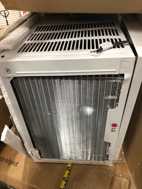 Photo 2 of * DAMAGED MISSING HARDWARE* LG 24,500 BTU Smart Window Air Conditioner, 230/208V, Cools Room up to 1560 Sq. Ft. for Bedrooms, Living Room, Apartments, with Remote, 3 Fan Speeds, 24-Hour Timer, White