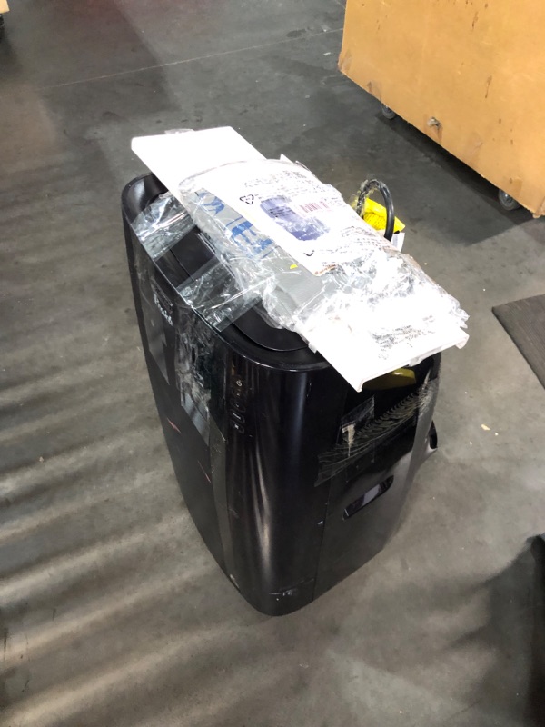 Photo 2 of ***DAMAGED - MISSING PARTS - SEE COMMENTS***
De'Longhi 14000 BTU Portable Air Conditioner, Dehumidifier & Fan + Cool Surround Remote w/Built-in Temperature Control Sensor & Quiet Mode, 700 sq ft, XLarge Room, Pinguino 8600 BTU (DOE), BLACK