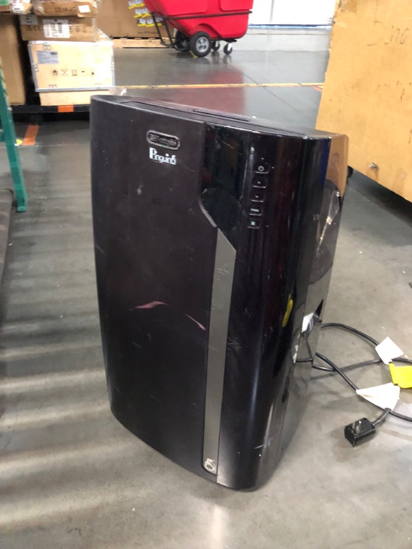 Photo 1 of ***DAMAGED - MISSING PARTS - SEE COMMENTS***
De'Longhi 14000 BTU Portable Air Conditioner, Dehumidifier & Fan + Cool Surround Remote w/Built-in Temperature Control Sensor & Quiet Mode, 700 sq ft, XLarge Room, Pinguino 8600 BTU (DOE), BLACK