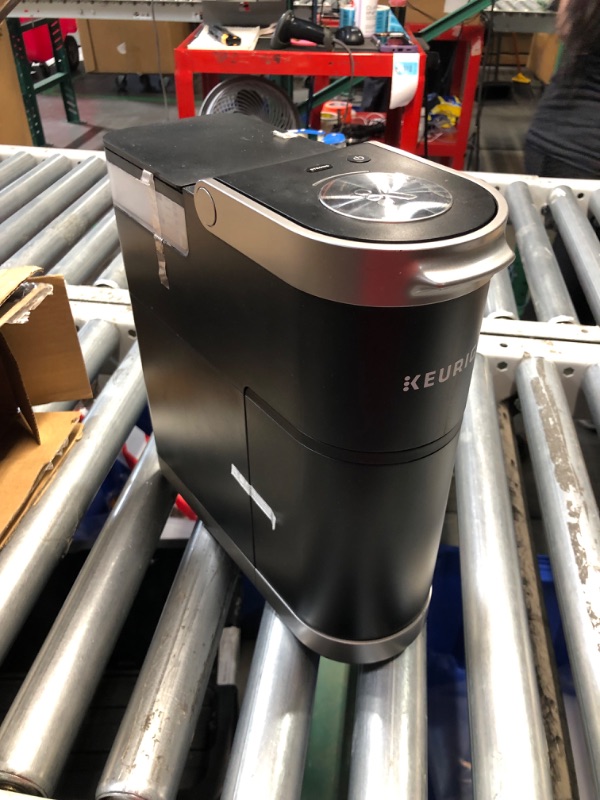 Photo 7 of ***HEAVILY USED AND DIRTY - POWERS ON - UNABLE TO TEST FURTHER***
Keurig K-Mini Plus Single Serve K-Cup Pod Coffee Maker, with 6 to 12oz Brew Size, Stores up to 9 K-Cup Pods, Travel Mug Friendly, Matte Black