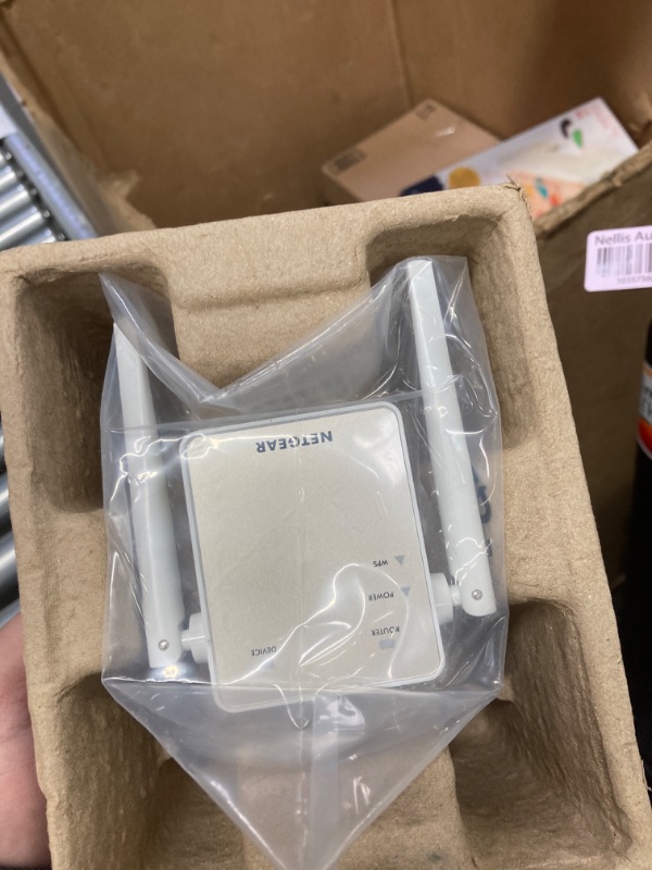 Photo 1 of NETGEAR Wi-Fi Range Extender EX6120 - Coverage Up to 1500 Sq Ft and 25 Devices with AC1200 Dual Band Wireless Signal Booster & Repeater (Up to 1200Mbps Speed), and Compact Wall Plug Design, White