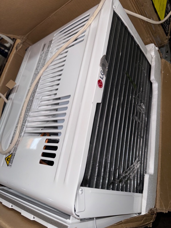 Photo 2 of *POWERS ON JUST DOESNT BLOW AIR** LG LW8024RSMX Window Conditioner, Wi-Fi Enabled w/Remote, 350 Sq.Ft, 4-Way Air Deflection, 3 Cooling and Fan Speeds, 115V, 8,000 BTU, White